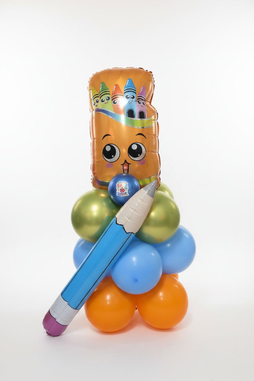A novelty balloon sculpture shaped like a pencil character, featuring a gold-orange pencil body with a cartoon face, blue and light blue balloons, green and orange balloons, and a small round blue balloon with a crayon graphic, set against a plain white background.
